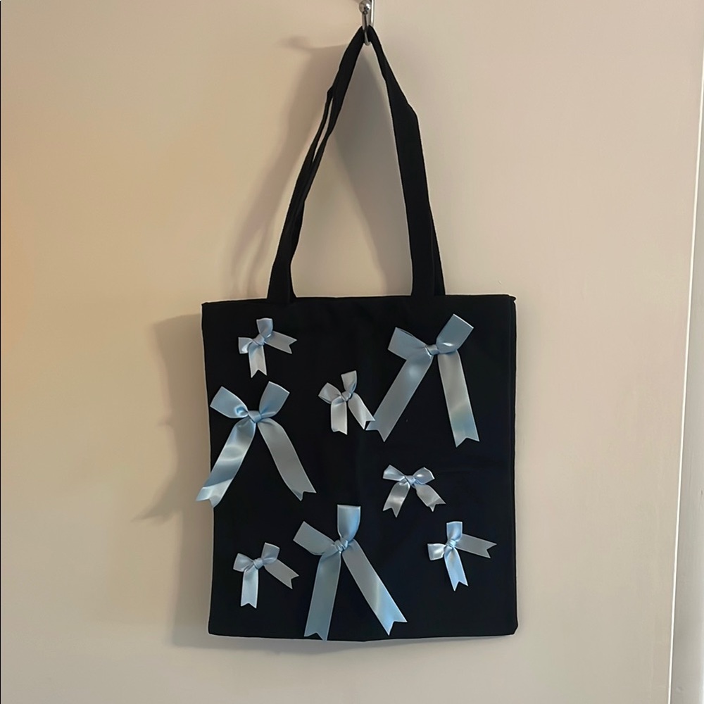 Elegant Black Tote Bag with Blue Bows